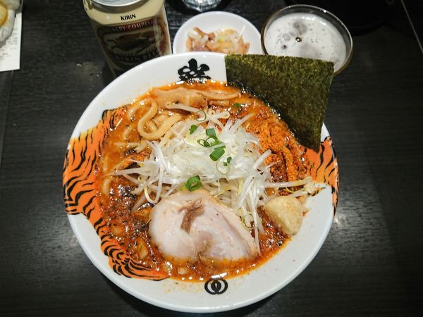 「缶ビール350ml 360円＋濃厚味噌ら～麺920円＋七味50円」@麺屋武蔵 巌虎の写真