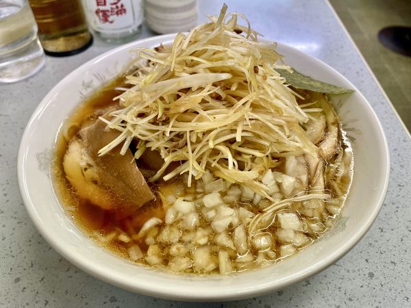 「アサヒスーパードライ＋メンマ皿→熱燗→ネギチャーシューネギ増」@丸幸の写真