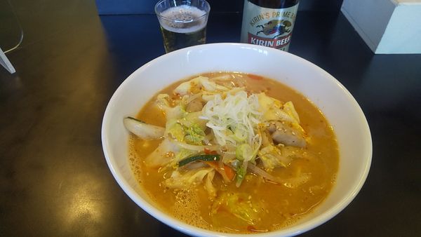 「キリン一番搾り・小瓶+ピリ辛モツタンメン(¥300+650)」@吾ガ輩ハネコの写真