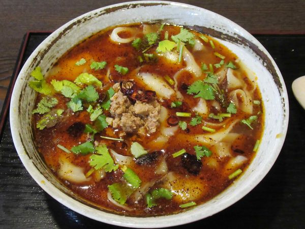 「麻辣刀削麺（850円）」@日野餃子 & 刀削麺の写真