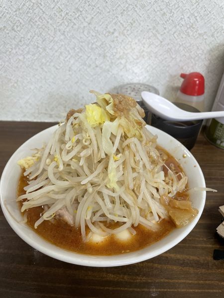 「辛ラーメン＋ウズラ」@ラーメン武丸の写真