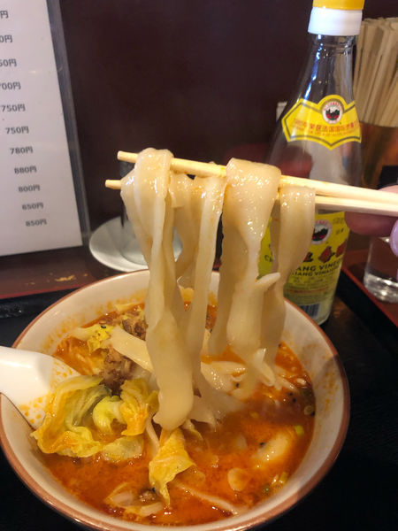 「刀削麺(赤)」@中華 錦亭の写真