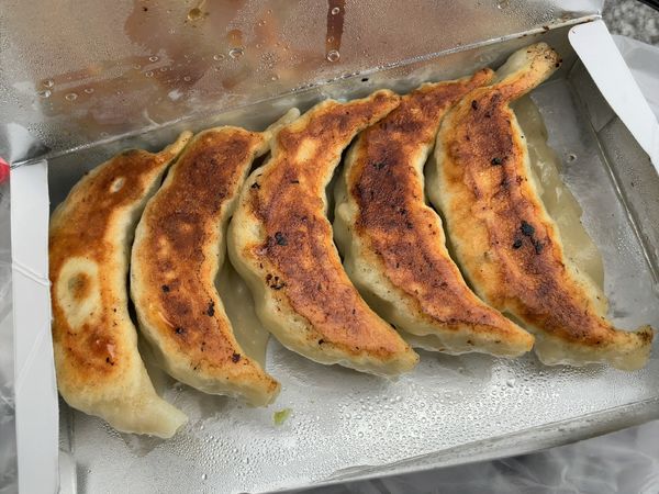 「ぎょうざ おみやげ」@一品香 駒生店の写真