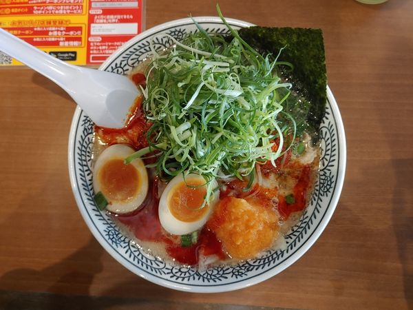 「辛肉そば　味玉　ドッカンねぎ　糖質50%オフ麺」@丸源ラーメン 当知店の写真