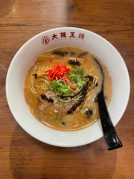 「黒とんこつラーメン(642円)」@大阪王将 子安店の写真