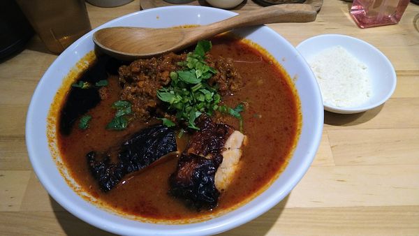 「チリトマラーメン(辛さ３)+チーズ(クーポン)・ミートソース」@チリトマラーメン THANKの写真