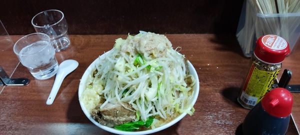 「ラーメン豚増し味玉」@D麺の写真