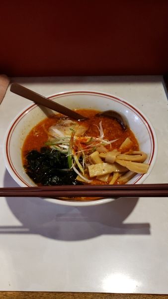 「黒酢赤ラーメン850円」@めんみん亭の写真