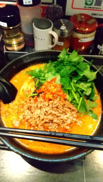 「坦々麺中辛+パクチー」@地獄の担担麺 天竜 トツカーナモール店の写真