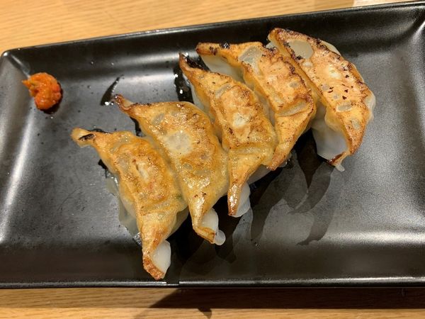 「A定食(白丸元味+博多ひとくち餃子(ハーフ)+白ごはん)」@一風堂 浜松町スタンドの写真