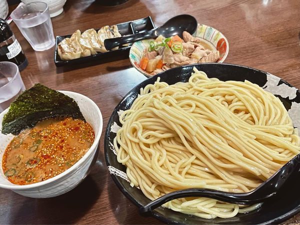 「辛とん(特盛)+もつ煮」@越後ラーメン 維新 湯沢本店の写真