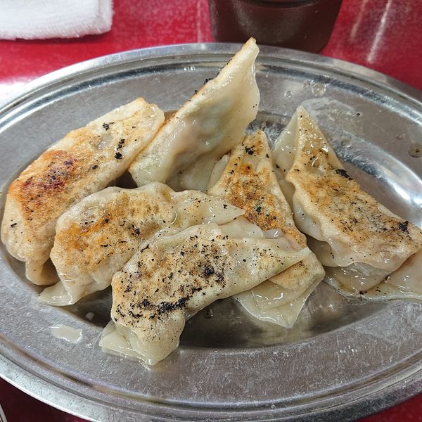 「半チャンラーメン700円、もつ煮450円、餃子250円」@とん平食堂の写真