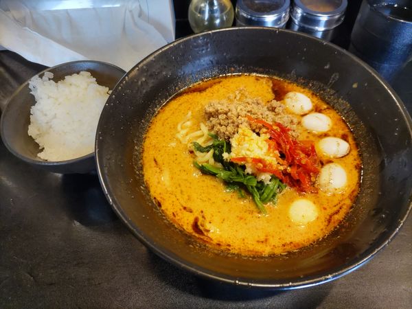 「黒の修羅場(Lv2)·うずらの卵·ライス」@地獄の担担麺 護摩龍 百人町総本山の写真