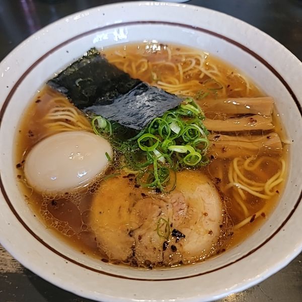 「【地雷源20周年限定】裏七時代の我流旨味ソバ肉増し煮玉子付き」@中華そば しながわの写真