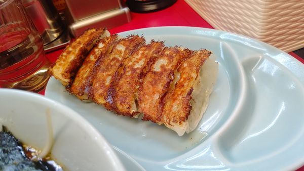 「LINEお友達クーポン餃子」@ラーメン山岡家 長岡堺店の写真