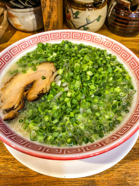 「とんこつラーメン+ネギ」@らーめん達の写真