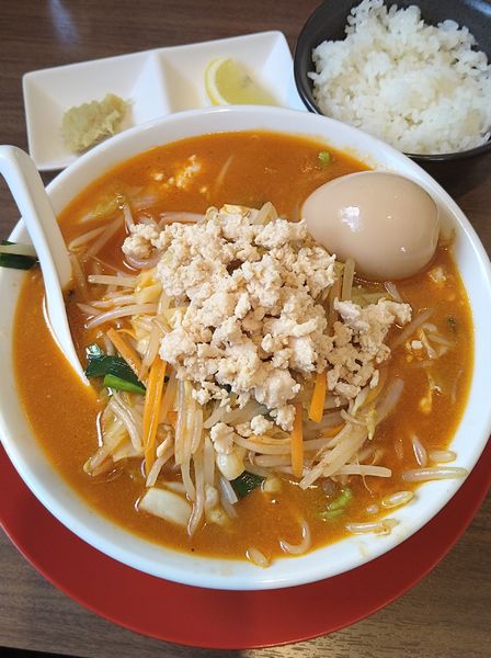 「辛味噌タンメン+煮卵､追い飯」@濃厚鶏白湯タンメン まつ井の写真
