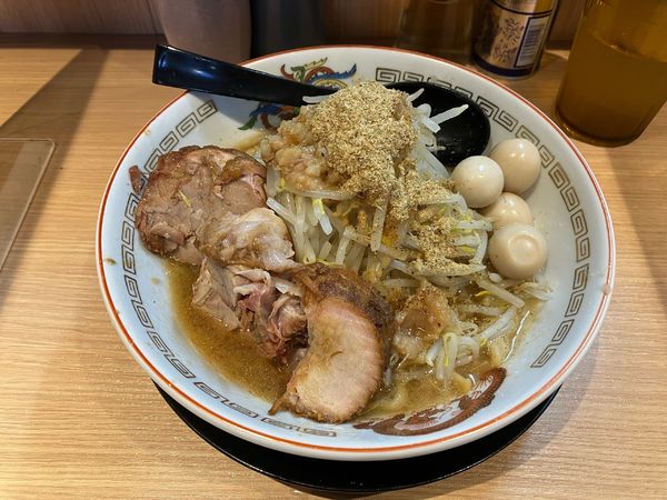 「ミニラーメン（うずらトッピング、アブラ）」@ラーメン豚山 門前仲町店の写真