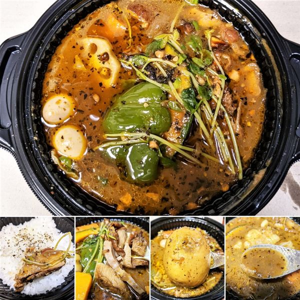 「燻製チキンのスープカレー　1300円」@居酒屋 旭一の写真