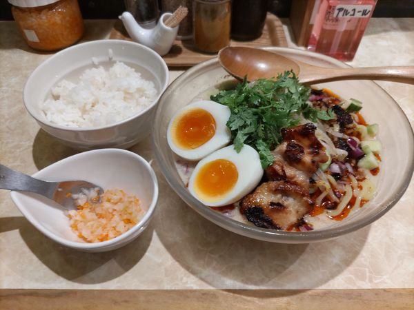 「冷しタンタン麺(辛口)·塩卵·手羽先·ライス(小)」@鶏ポタラーメン THANK 大門店の写真