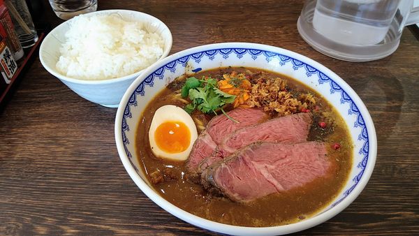 「【期間限定】ビーフカレーラーメン+ライス大」@味噌ラーメン 雪ぐにの写真