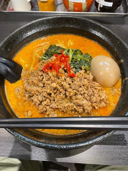 「地獄の坦々麺中級（麺大盛）+味玉」@地獄の担担麺 天竜 トツカーナモール店の写真