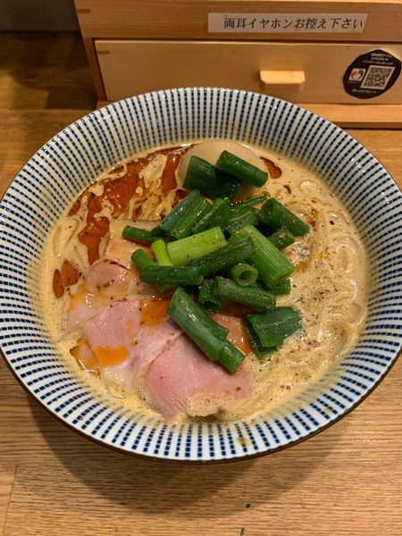 「味玉ふく流らーめんRED」@ふく流らーめん 轍 LINKS UMEDA店の写真