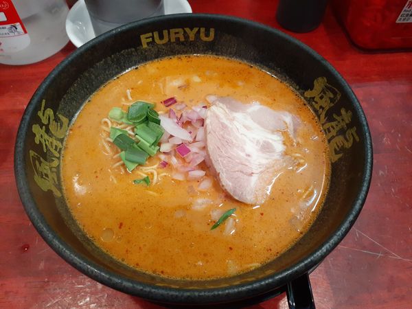 「辛ラーメン、替玉2玉」@とんこつラーメン 博多風龍 渋谷店の写真