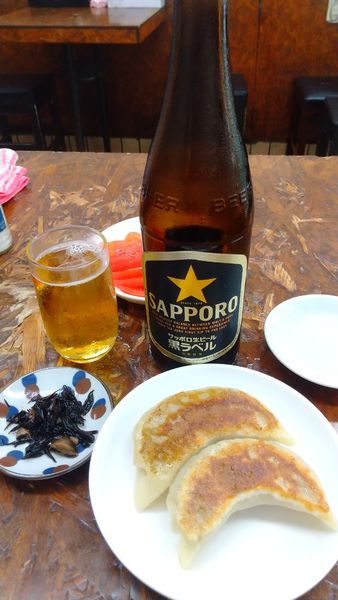 「サッポロ黒ラベル+ジャンボ餃子etc.」@らーめん太陽 高円寺店の写真