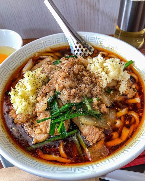 「スタミナラーメン+生卵」@MARU喜の写真