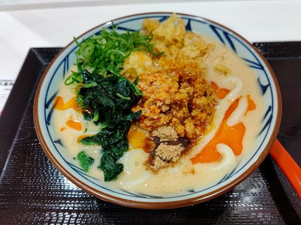 「うま辛担々うどん(並盛)690円」@丸亀製麺 イーサイト高崎店の写真