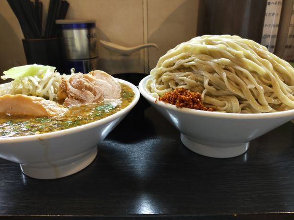 「【限定】カレーつけ麺(パクチー)大1400円+生卵50円」@豚星。の写真