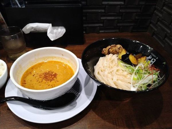 「秋ナスと牛モツの焦がし味噌坦坦つけ麺（期間限定）」@担担麺 胡 京都駅前店の写真