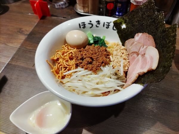 「特製汁なし担担麺 1100円+小ﾗｲｽ60円+ｸｰﾎﾟﾝ味玉」@自家製麺 ほうきぼし 赤羽駅前店の写真