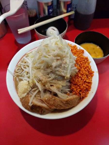 「ラーメン(麺少なめ)＋豚1枚追加＋生卵」@千里眼の写真