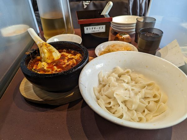 「頂天石焼麻婆刀削麺」@陳家私菜 新宿店の写真