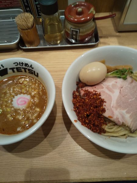 「辛つけめん（味玉付き）」@つけめんTETSU 名古屋JRゲートタワー店の写真