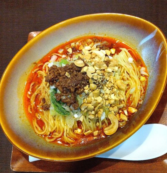 「汁なし担担麺(ゲキ辛) 1000円」@熊猫飯店の写真