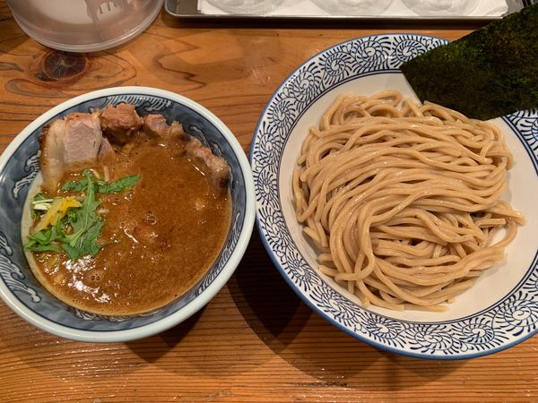 「肉入り辛つけめん」@道玄坂マンモスの写真