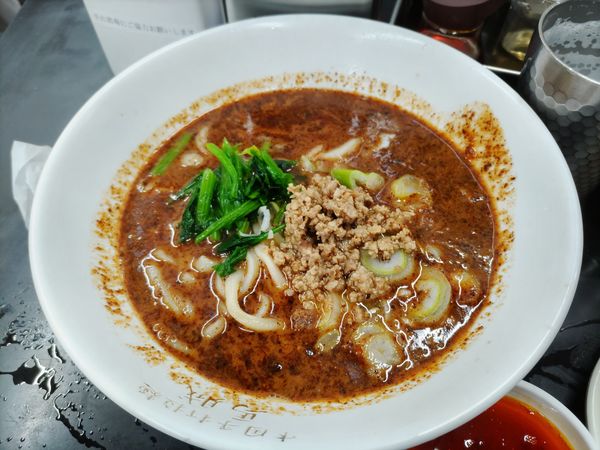 「担々麺（1050円）+ﾋﾞｰﾙ+餃子+ﾗｲｽ」@中国手打拉麺 馬賊 日暮里店の写真