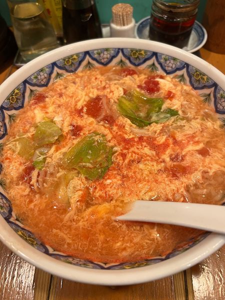 「トマ玉ラーメン」@中国ラーメン 揚州商人 池袋西口店の写真
