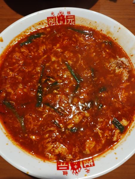 「トマト辛麺(18辛)(うどん麺)(なんこつトッピング)」@辛麺屋 桝元 高崎インター店の写真