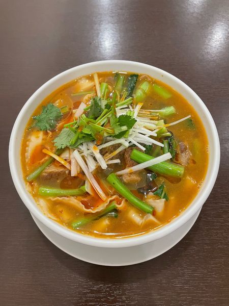 「牛バラ煮込み刀削麺(990円)」@許厨房の写真