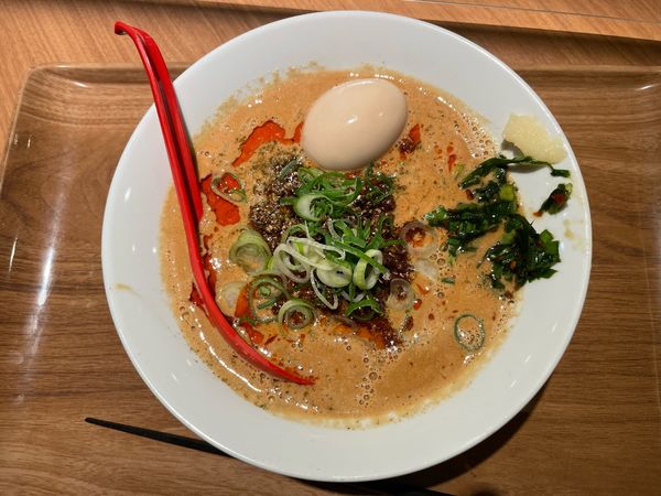 「担々麺 煮卵トッピング」@どうとんぼり神座 UMEDA FOOD HALL店の写真
