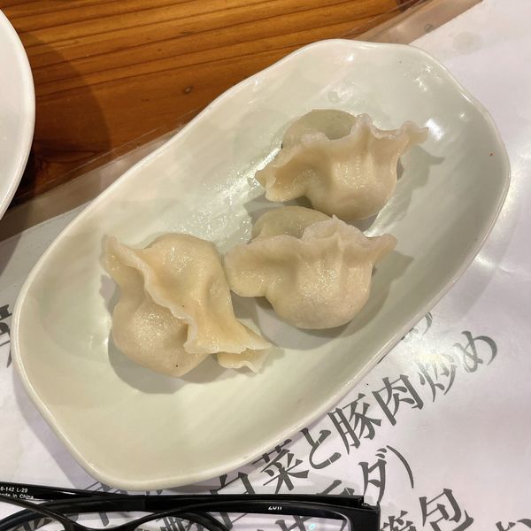 「酸菜猪肉（発酵白菜水餃子）」@老酒舗の写真