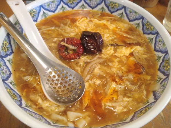 「激辛酸辣麺」@中国ラーメン 揚州商人 相模大野北口店の写真
