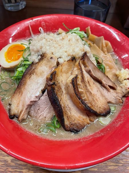 「豚骨細麺」@釈迦力 雄 門真店の写真