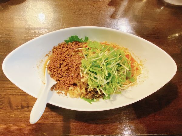 「つゆ無し(白胡麻):990円、温玉と半ライス:100円」@四川担担麺 阿吽 湯島店の写真