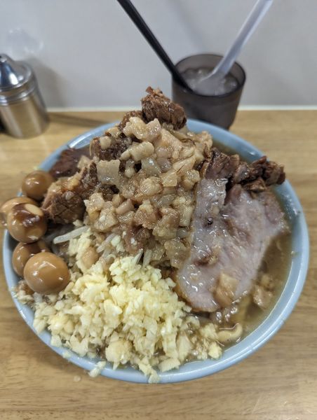 「豚ラーメン・漬けうずら」@俺の生きる道 白山店の写真