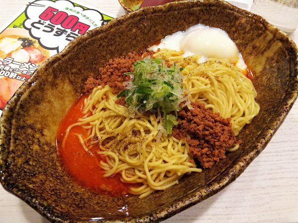 「汁なし担担麺　大盛り　※㋗で５００円　＋温玉」@中華そば くにまつ 松本店の写真
